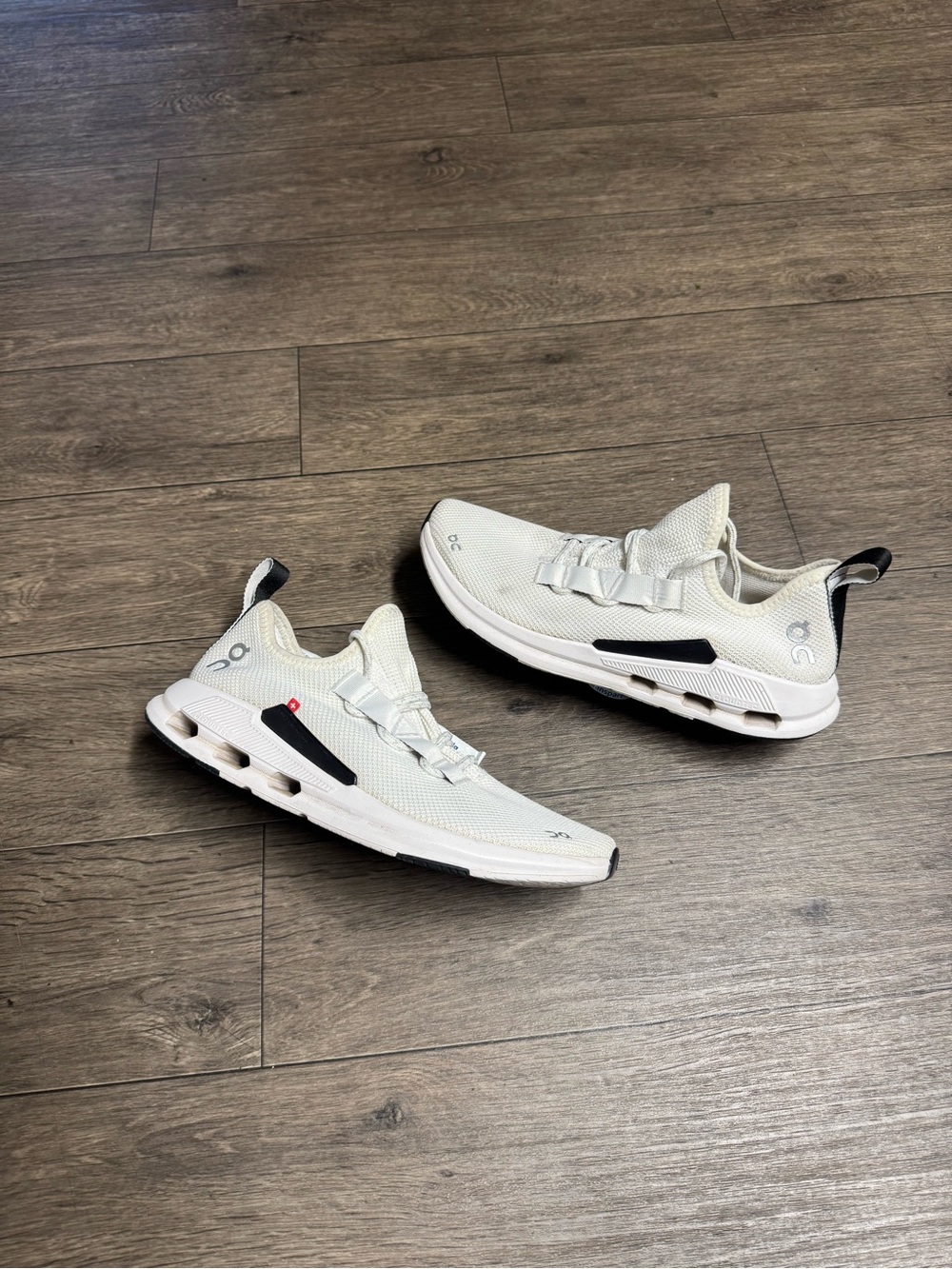 On Running Women’s Cloud Sneakers in White with Black Accents